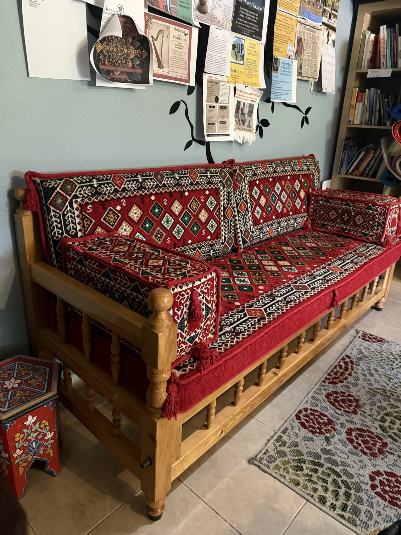 Patterned seating bench in the lobby area at Blue Anjou Yoga Studio