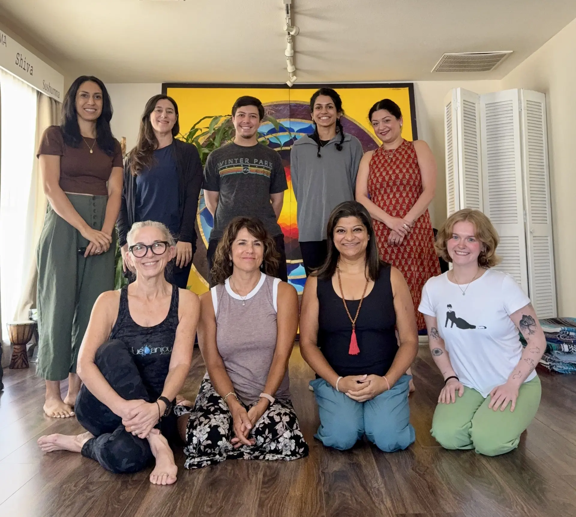 Teachers gathered together at Blue Anjou Yoga Studio