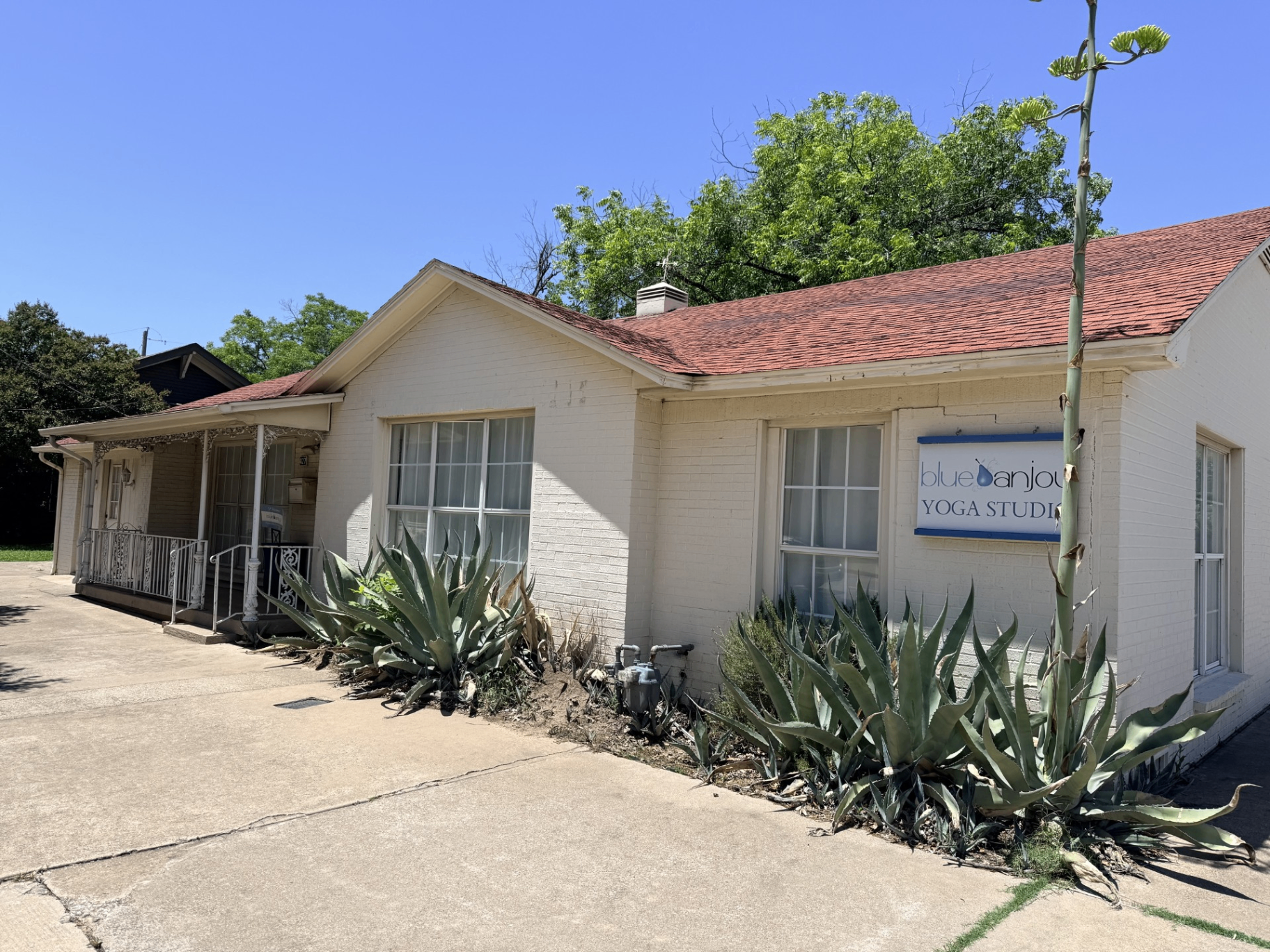 Front of Blue Anjou Yoga Studio in Old Town Lewisville